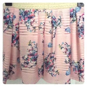 Pink based skirt with flowers